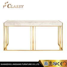 Use them in commercial designs under lifetime, perpetual & worldwide rights. China Rectangular Stainless Steel Frame Console Desk In Golden Polished With Thick Marble Top China Stainless Steel Golden Mirrored