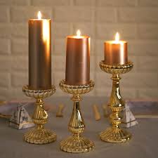 The candle holder you choose should be heat resistant, sturdy, and large enough to catch drips of hot welted wax. Home Garden Large 3 Pieces Gold Mercury Candle Holders With Candle Wedding Decor Candles