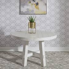 This table is great for intimate conversations, dinners on the patio, or even serving up a few extra snacks. Liberty Furniture Modern Farmhouse Contemporary Round Dining Table With 12 Removable Leaf Furniture Mart Colorado Kitchen Tables