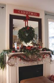 The festive reindeer decoration and miniature wagon full of gifts around the tree complete the look. 190 Christmas Mantle Ideas Christmas Mantle Christmas Decorations Christmas