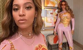 Beyonce looks chic as she flaunts her enviable curves in a pink Charlotte  Knowles ensemble