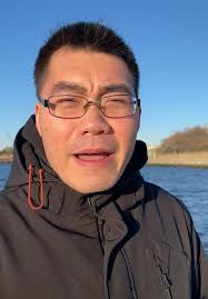 Chinese Guy Excels in Singing Bachata Spanish Music