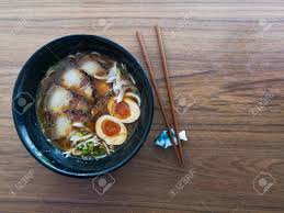 We did not find results for: A Black Bowl Of Shoyu Ramen Noodles With Pork And Eggs On Wooden Table Stock Photo Picture And Royalty Free Image Image 152674857