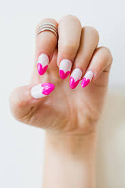 Valentine's day is the perfect excuse to adorn your fingertips with hearts, glitter, and multiple shades of pink. Diy This Cute Heart Manicure For Fun Pink Nail Art Bespoke Bride Wedding Blog