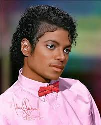 KATHERINE JACKSON HOLDING A BABY...BUT NO ONE WANTS TO TALK ABOUT THE  POCKETBOOK IN THE BACKGROUND