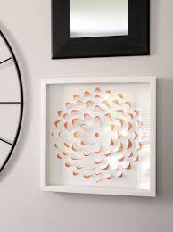 Yesterday's post on my love conquers all painted canvas was about creating artwork yourself. This 3 D Flower Artwork Can Be Made In Less Than An Hour