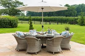 We aim to deliver this to you within 28 working days. Maze Rattan Oxford 8 Seat Round Ice Bucket Dining Set With Heritage Chairs The Clearance Zone