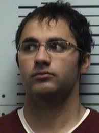 Man charged with impersonating officer at Springfield school