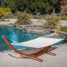 With no more need for trees, you're free to move your portable hammock set from the patio to the pool or down into the garden. Noble House Grand Cayman 13 Ft Free Standing Outdoor Hammock With Stand 295165 The Home Depot Outdoor Hammock Backyard Hammock Patio Furniture Deals