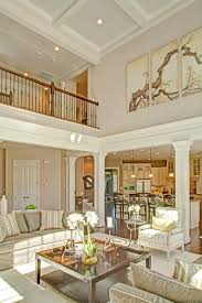 A first cousin of a coffered ceiling, a paneled ceiling is a great way to dress up a room of any size, such as a living room in an open floor plan. Two Story Family Room With Coffered Ceiling Google Search In 2020 High Ceiling Living Room Living Room Ceiling Family Room Decorating