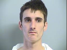 Police: Man arrested after trying to break into home while woman inside