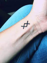 Something i've been wanting for years and finally got done today! Bizarre My First Tattoo It S Called Inguz It S A