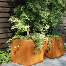 Corten steel planters corten steel planters arrive in gray steel finish and develop a rich brown rust patina over time. Adezz Corten Steel Andes Planter