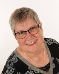 Seven Questions with Mystery Writer Sara Sue Hoklotubbe