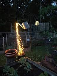 Today We Have A Beautiful Outdoor Diy Project To Share With You This Glowing Watering Garden Lighting Diy Solar Lights Garden Decorating With Christmas Lights