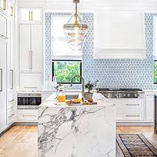 White cabinets are still classic. Upcoming Kitchen Tile Trends 2021 Tileist By Tilebar
