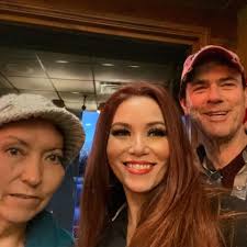 Georgia State Defense Force (GSDF) Commanding General Brig. Gen. Dennis  Watts presents the commander's challenge coin to Sgt. Dennis Pham for this  Soldier's life-saving response during a medical emergency that occurred in