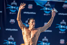 Just a bunch of shots of michael phelps posing with all his olympic medals. Michael Phelps Documentary Series Medals Memories More Coming To Peacock Tv Swimming World News