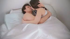 It depends on the relationship. Couple Man And Woman Hug And Kiss Lying In Bed Intimate Relationship Sex Stock Video Adobe Stock