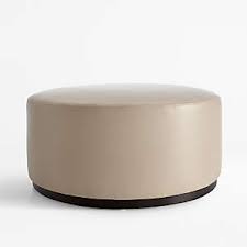This stylish ottoman allows you to sit and store a few items and can even turn into an end table. Leather Ottomans Crate And Barrel