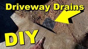 A catch basin helps to reduce downspout drainage problems in two ways. Driveway Drainage Channel Drain Or Catch Basin Youtube