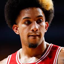 No. 13 Wisconsin escapes Minnesota with 61-59 win