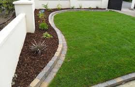 Brick or other hard materials help keep the lawn out of flower beds. Loading Backyard Garden Design Brick Landscape Edging Brick Garden