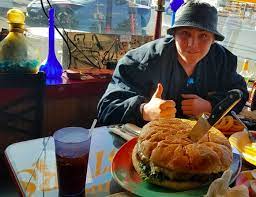 The Monster Burger At Oregon S Newport Cafe Is So Gigantic It Falls Off The Plate Burger Oregon Food