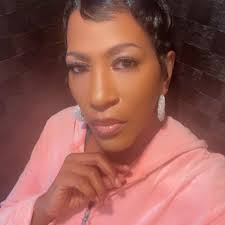 Why is my yellow rose bush stopping blooming and growing red branches?