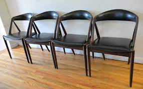A mid century wingback chair pairs great with sofas & sectionals to make a design statement in your living room. Mid Century Modern Dining Chairs By Kai Kristiansen Picked Vintage