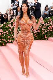 Smoky eyes and thick black eyeliner. Kim Kardashian On Met Gala Corset Innocent Intent For Kimono Line