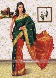 Be it even a complete red set with hints of green is beautiful. Dark Red And Bottle Green Silk Saree