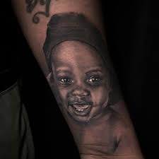 Tattoo artists for dark chocolate skin tones
