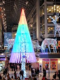 A Rainbow Christmas Tree In Toronto Eaton Center Rainbow Christmas Tree Rainbows Christmas Thanksgiving Decorations