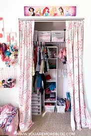 I keep two or three garment bags filled with items that are more special occasion or out of season in a storage closet. Shared Small Closet Organization For Girl S Room You Are More