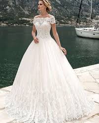 Awesome Designer Wedding Dresses This Slightly Modest Short Sleeve Wedding Gown Has An Illusion Neckline Bridal Dresses Wedding Dresses Wedding Dresses Unique