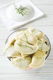 Pierogi With Sauerkraut And Mushroom Filling Garlic Matters Rezept Essen Rezepte Weihnachtsessen