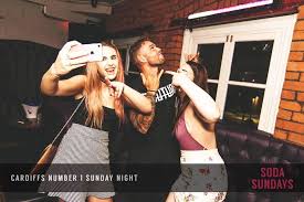 The back of the hand is shown with the… emoji meaning a finger heart gesture where the index finger and thumb cross, creating the appearance of a very small heart shape.… What The Hell Is This Shaka Pose And Why Is Every Guy In Every Nightclub Doing It