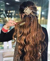Add in some braids or hair pieces if you'd like, or leave it as is—either way, you can't go wrong with this one. Wedding Hairstyle Ideas For Mehndi Sangeet Wedding Reception Bridal Look Wedding Blog