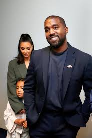 In the sweet shot, the reality star sat on a set of stairs with her youngest, 7 months, in her lap. Christmas Kim Kardashian Kanye West Buy North Michael Jackson Jacket