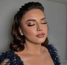 Who can recommend a makeup artist, hair stylist, and videographer for a  wedding in Beaufort, North Carolina?