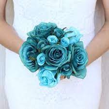 This bouquet was used in a recent bridal boudoir photo shoot and the images can be viewed on my. Teal Rose Silk Wedding Bouquet Silk Wedding Bouquets Prom Flowers Bouquet Turquoise Wedding Flowers