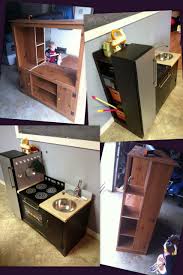 Diy Upcycle Tv Entertainment Stand Into Kids Play Kitchen We Used To Have This Same Entertainment Center Kids Play Kitchen Diy Play Kitchen Diy Kids Kitchen
