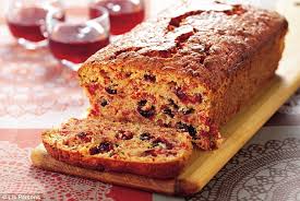 They all sit there in christmas cahoots with each other from beneath their cake domes. All Star Nigella Christmas Scarlet Speckled Loaf Cake Daily Mail Online