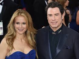It turns out John Travolta has been wearing a wig this whole time ... but  now he's finally ditched it!