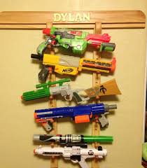 Space out 2 pegs at approximately the same length as hang a wire rack on your wall using screws, anchors, or other attachments depending on the wall material. Nerf Storage Ideas A Girl And A Glue Gun