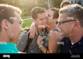 Sharon Ledesma kisses her son Sam, as he leaves for Induction Day at the  U.S. Naval Academy in Annapolis, Maryland, July 1, 2014. 1,192 men and  women arrived at the Naval Academy