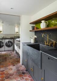 Amazing Mudroom Features Dark Grey Cabinets Painted Benjamin Moore Kendall Charcoal Adorned With Gold L Black Kitchen Sink Kitchen Flooring Brooklyn Brownstone