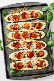 A delicious recipe that's perfect for summer. Pizza Stuffed Zucchini Boats Downshiftology
