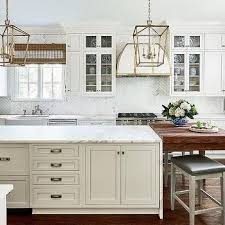 Cream Kitchen Island With Honed White Marble Countertop Kitchen Marble Kitchen Renovation Simple Kitchen